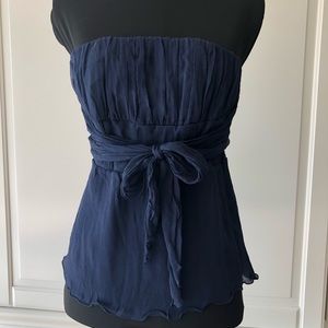 Blue, silk, strapless empire waist blouse with wrap around belt.